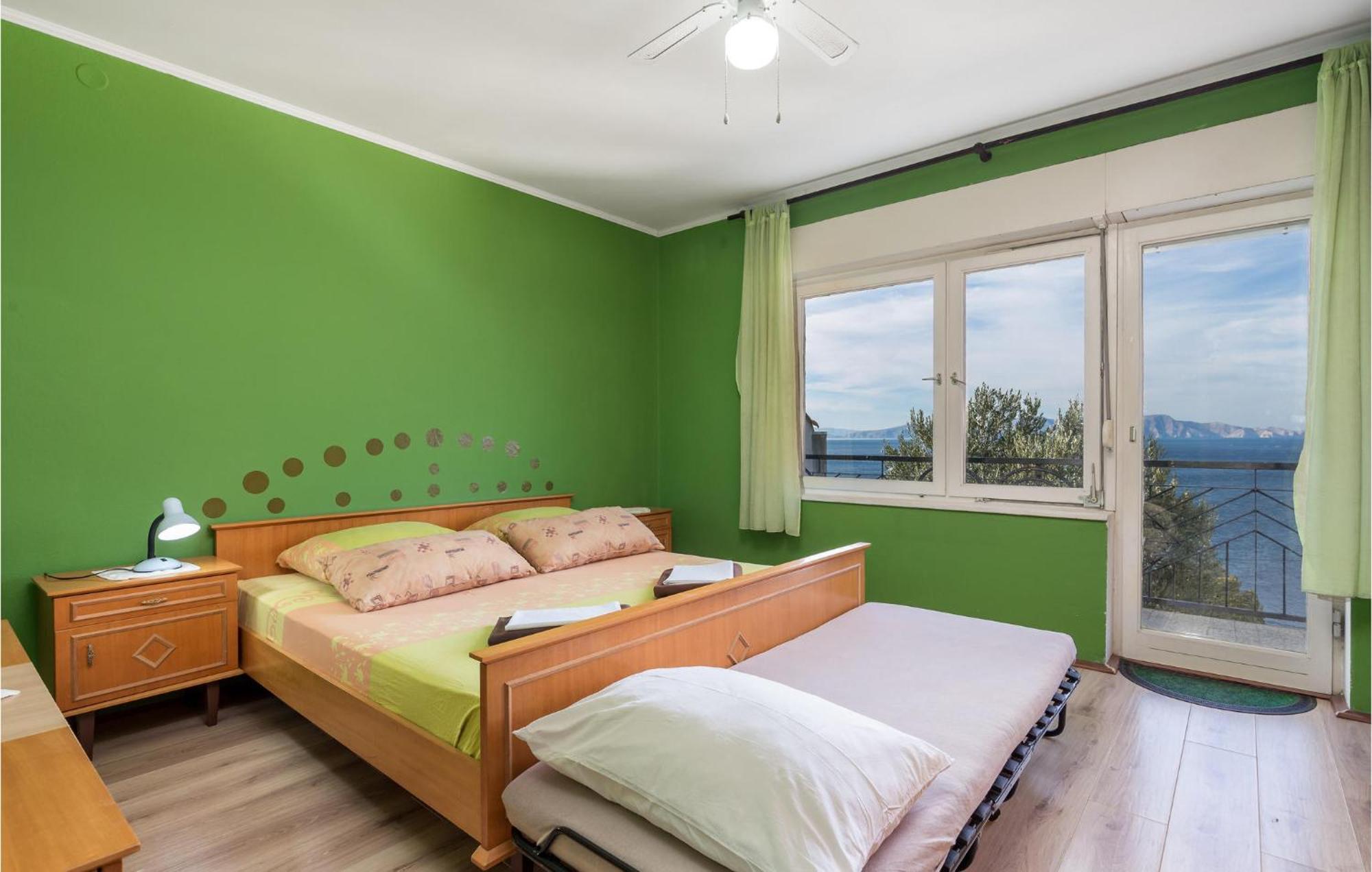 Amazing Apartment In Senj With House Sea View Eksteriør billede