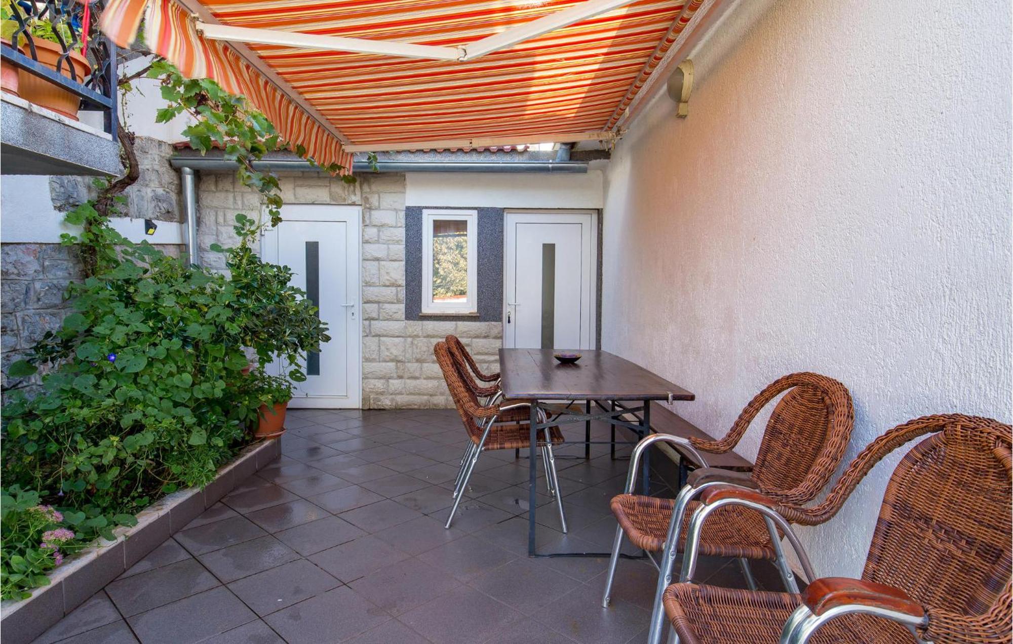 Amazing Apartment In Senj With House Sea View Eksteriør billede