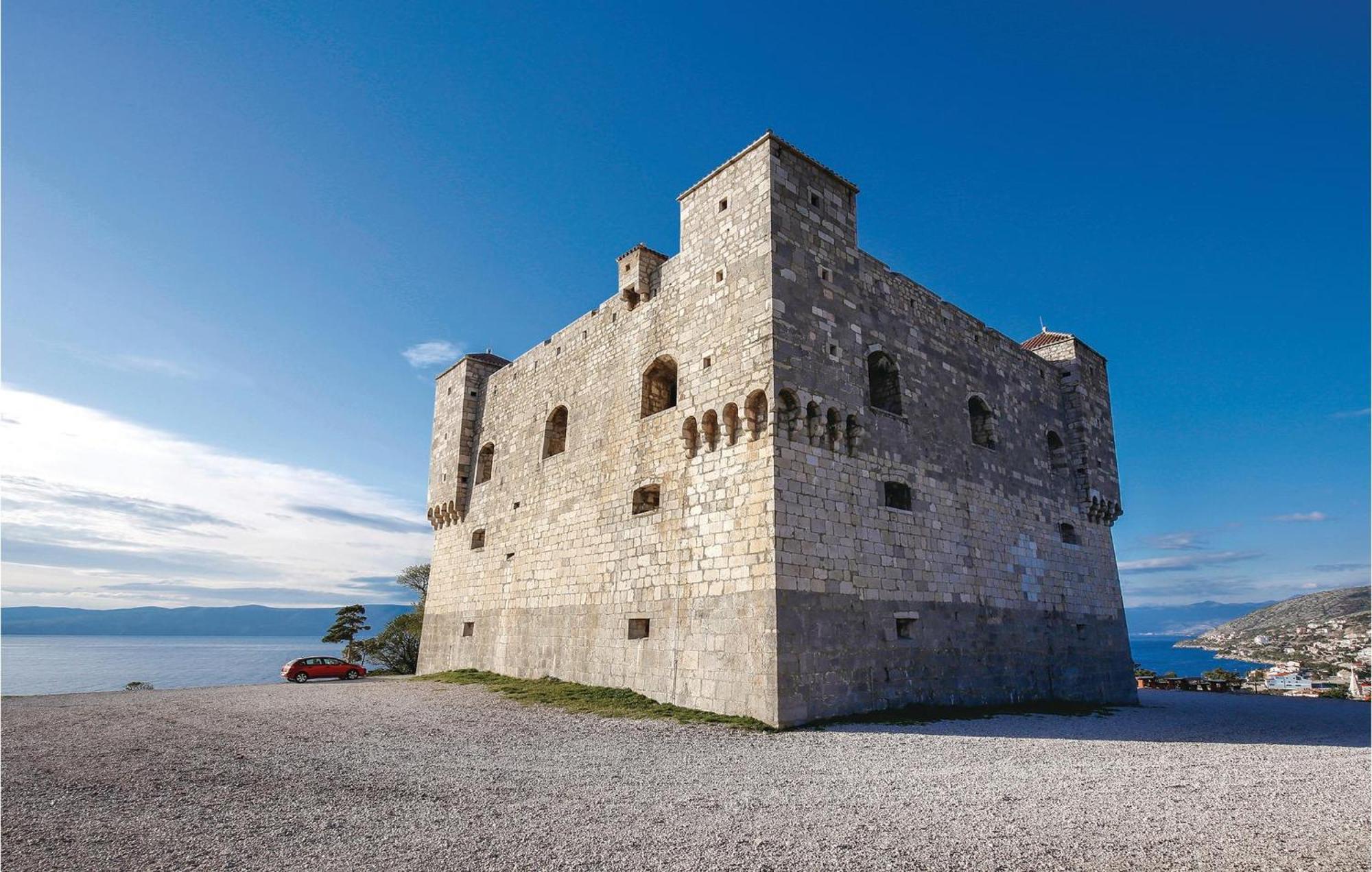 Amazing Apartment In Senj With House Sea View Eksteriør billede