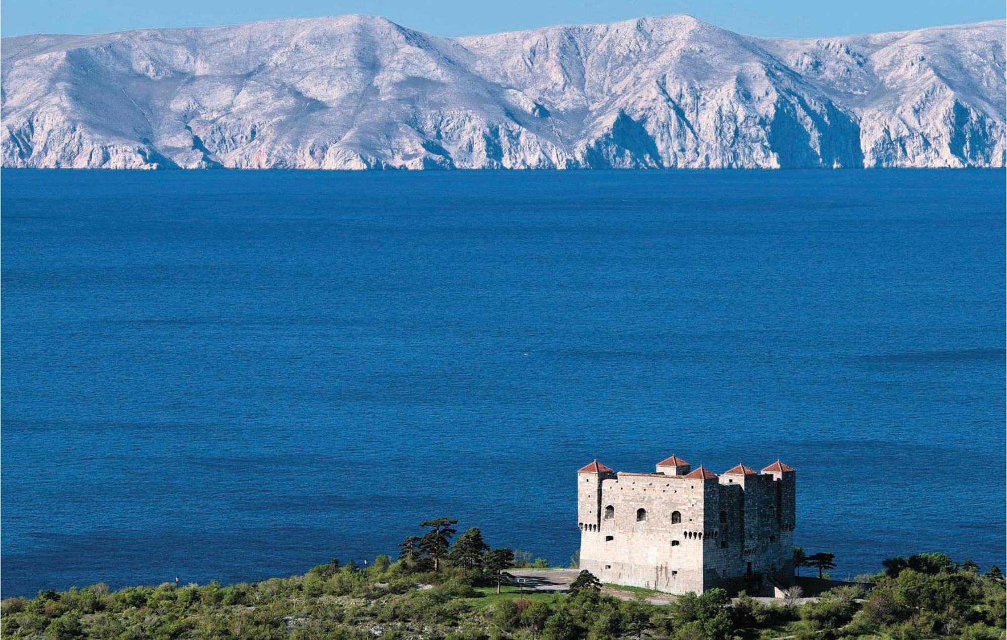 Amazing Apartment In Senj With House Sea View Eksteriør billede