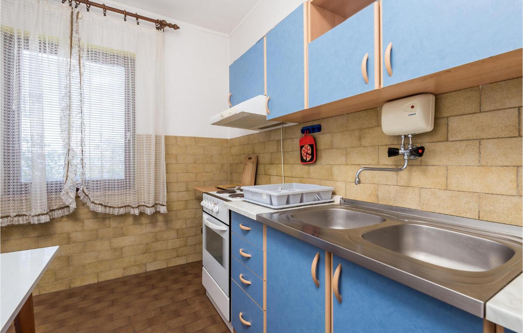 Amazing Apartment In Senj With House Sea View Eksteriør billede