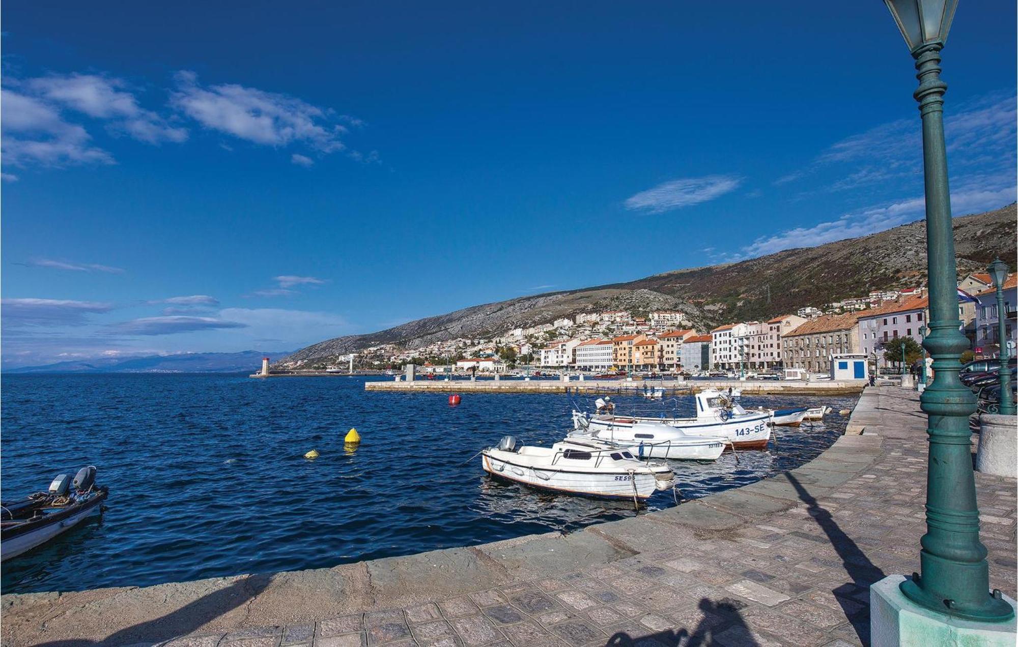Amazing Apartment In Senj With House Sea View Eksteriør billede