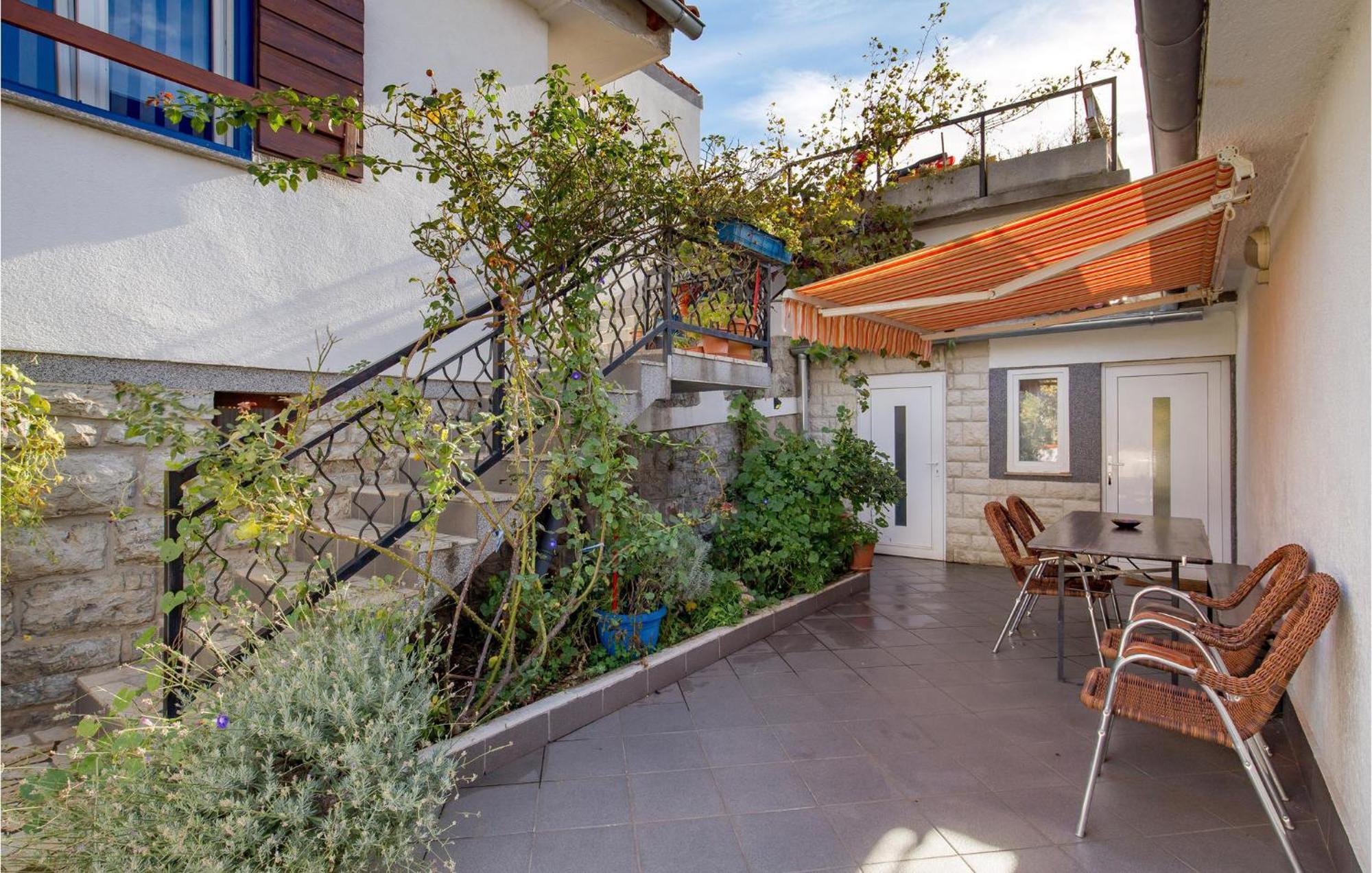 Amazing Apartment In Senj With House Sea View Eksteriør billede